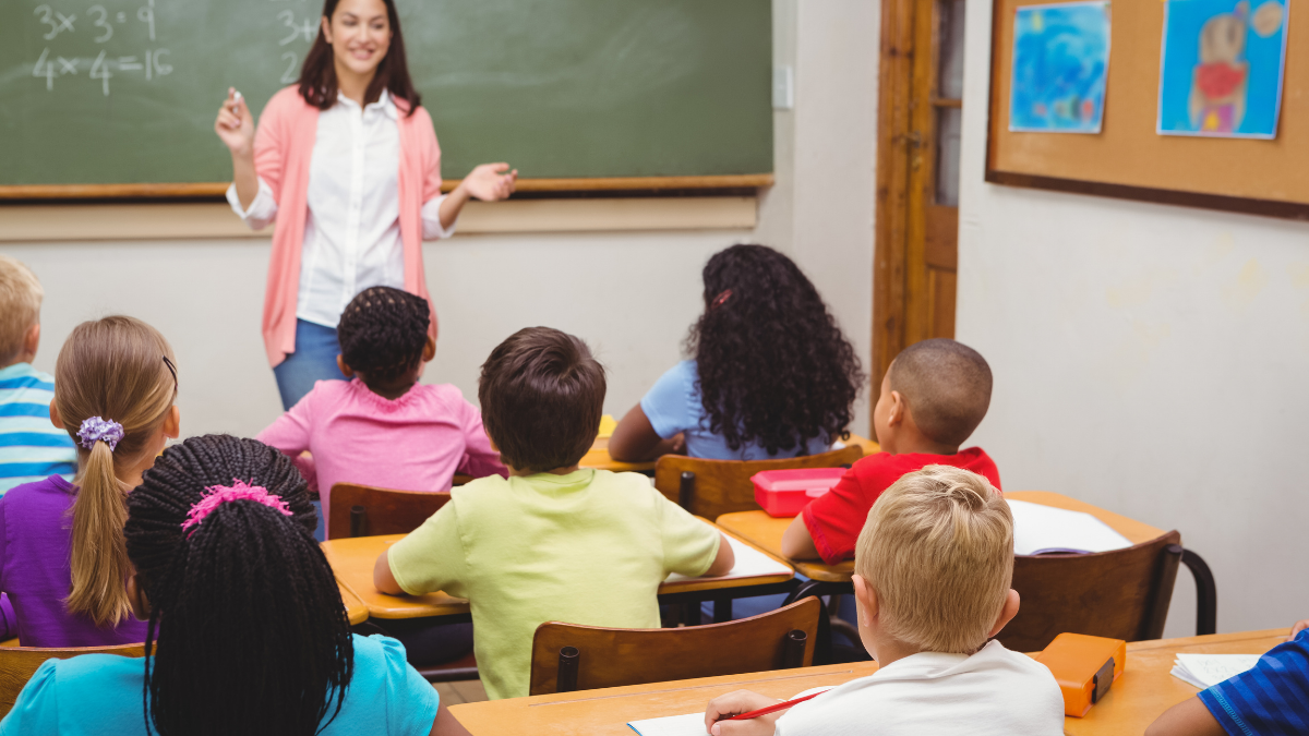 Educator navigating a hectic classroom